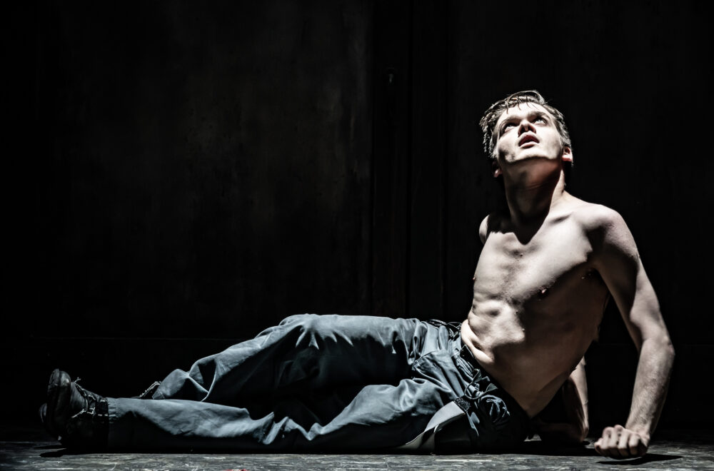 1060 Zak Ford-Williams on stage in The Real and Imagined History of the Elephant Man. Photo by Marc Brenner.